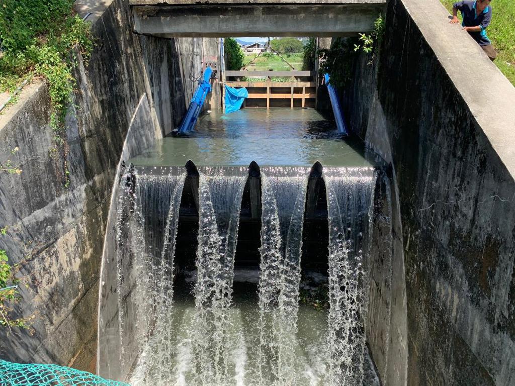 Opening Tilting Gate To Discharge Water